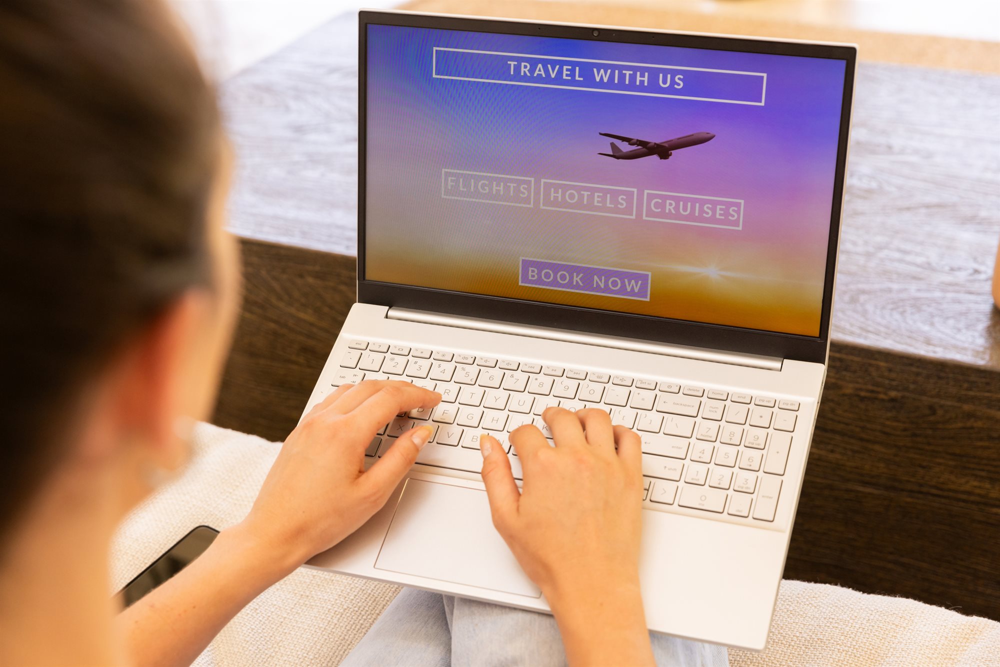 Planning a trip online with a laptop